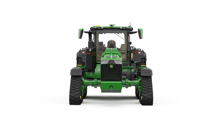 Front-facing studio shot of a 4-tracked green tractor on a white background.