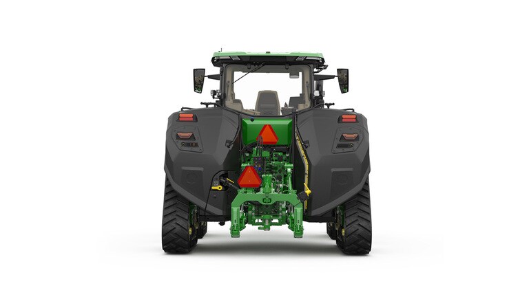 Rear-facing studio shot of a 4-tracked green tractor on a white background.