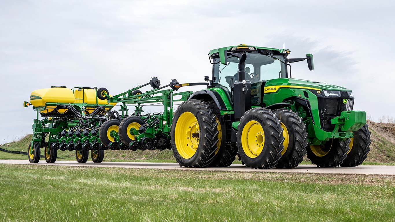 8r tractor on the road