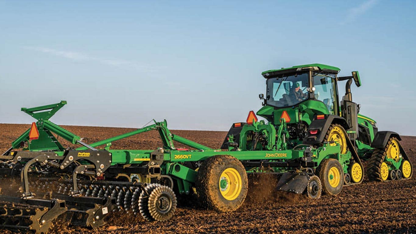 8r tractor in the field