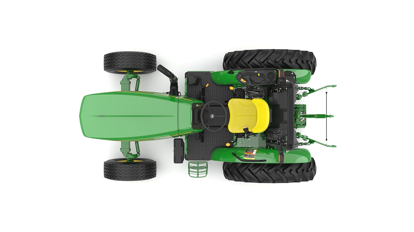 Tracteur utilitaire vert sur fond blanc.