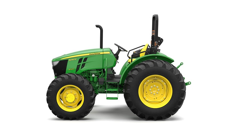 Tracteur utilitaire vert sur fond blanc.