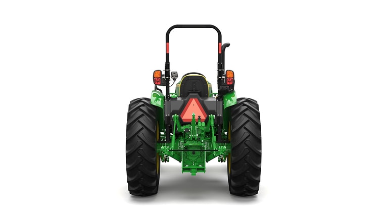 A rear-facing green utility tractor on a white background.