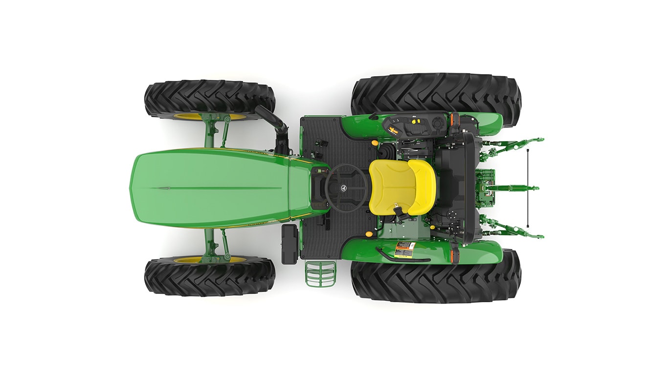 Tracteur utilitaire vert sur fond blanc.