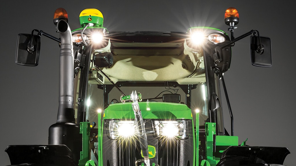 front on view of tractor with lights on