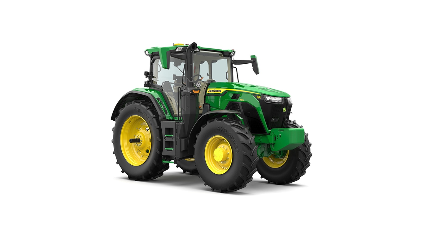 Studio shot of a front-right-facing cabbed green tractor on a white background.