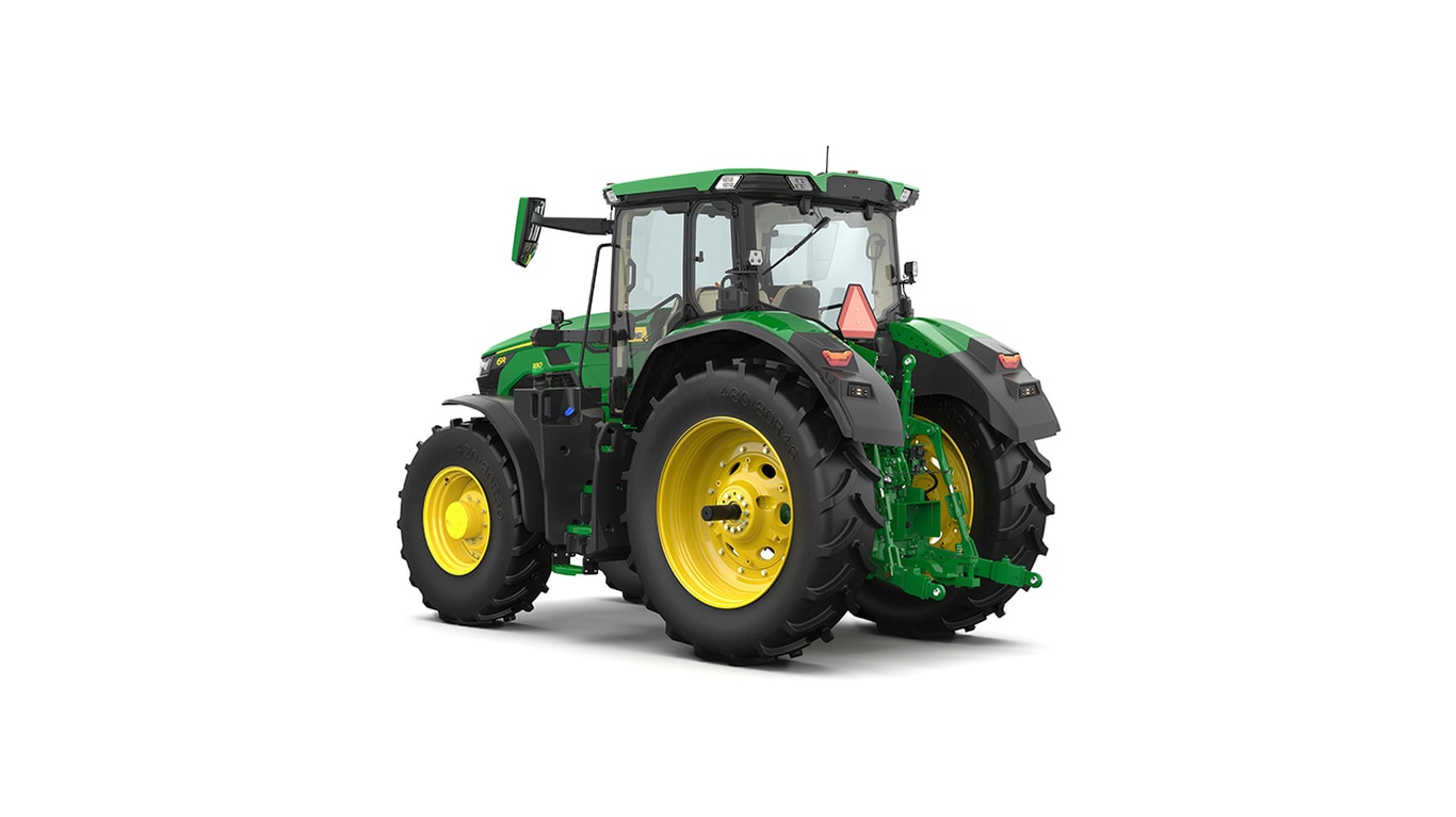 Studio shot of a rear-left-facing cabbed green tractor on a white background.