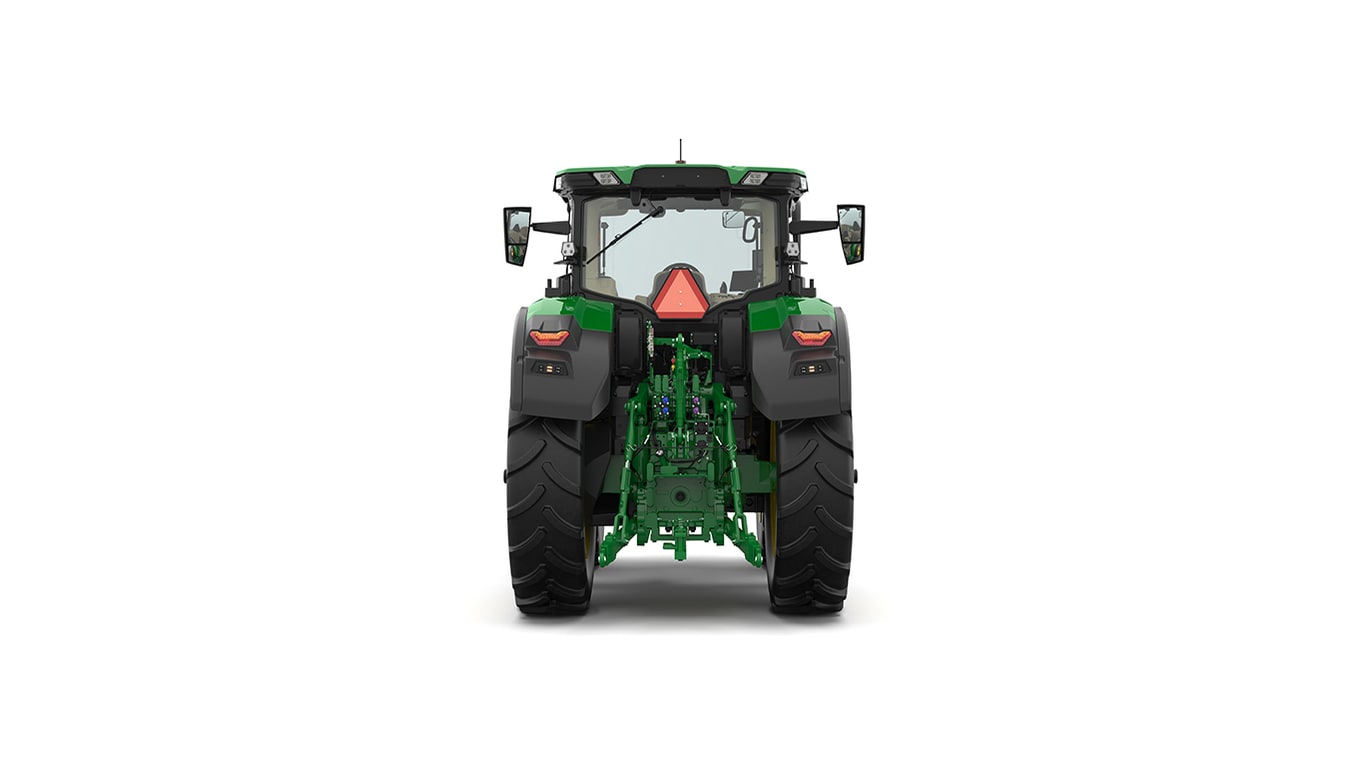 Studio shot of a rear-facing cabbed green tractor on a white background.