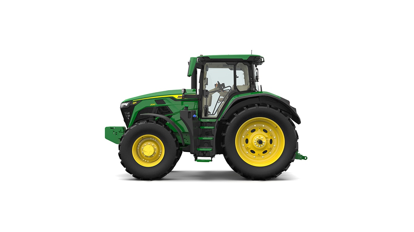 Studio shot of a left-facing cabbed green tractor on a white background.