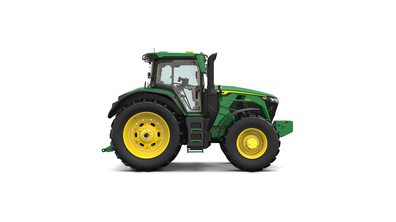 Studio shot of a right-facing cabbed green tractor on a white background.