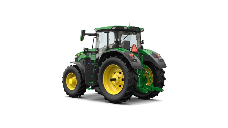 Studio shot of a rear-left-facing cabbed green tractor on a white background.
