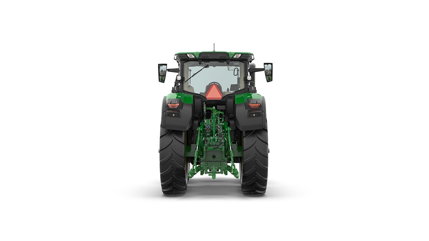 Studio shot of a rear-facing cabbed green tractor on a white background.