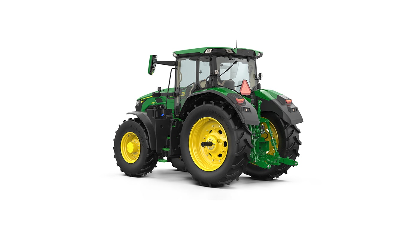 Studio shot of a rear-left-facing cabbed green tractor on a white background.
