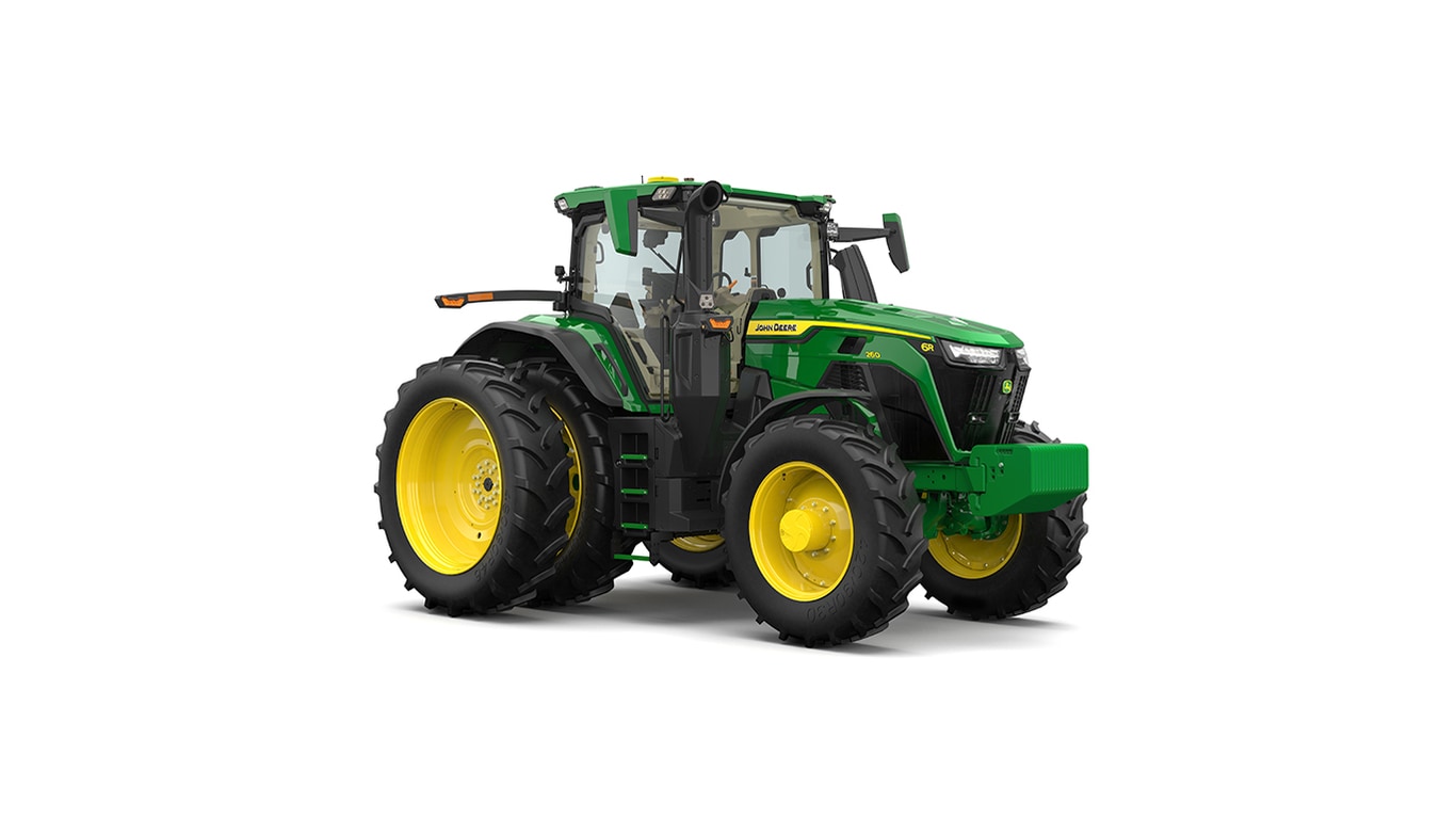 Studio shot of a front-right-facing cabbed green tractor on a white background.