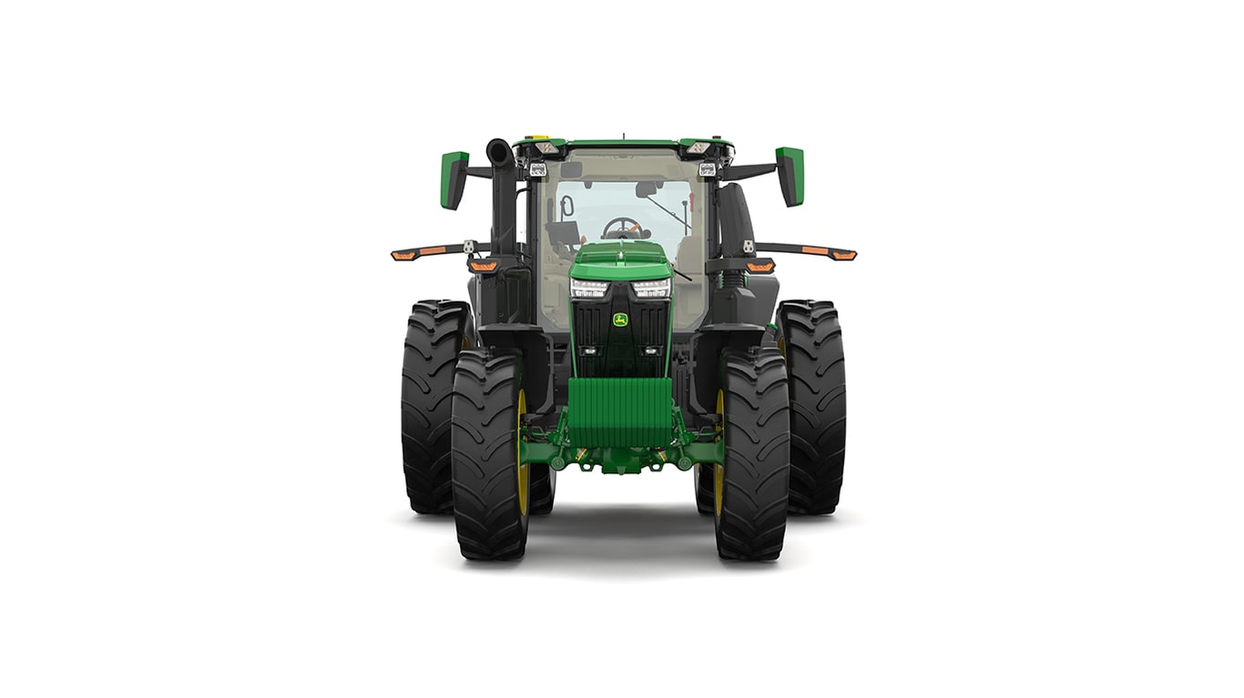 Studio shot of a front-facing cabbed green tractor on a white background.