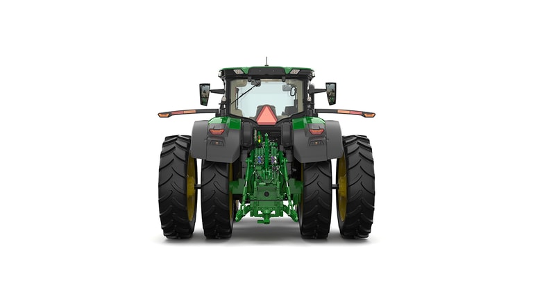 Studio shot of a rear-facing cabbed green tractor on a white background.