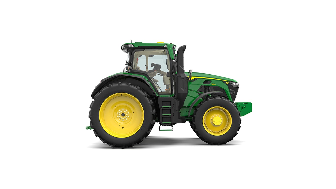 Studio shot of a right-facing cabbed green tractor on a white background.