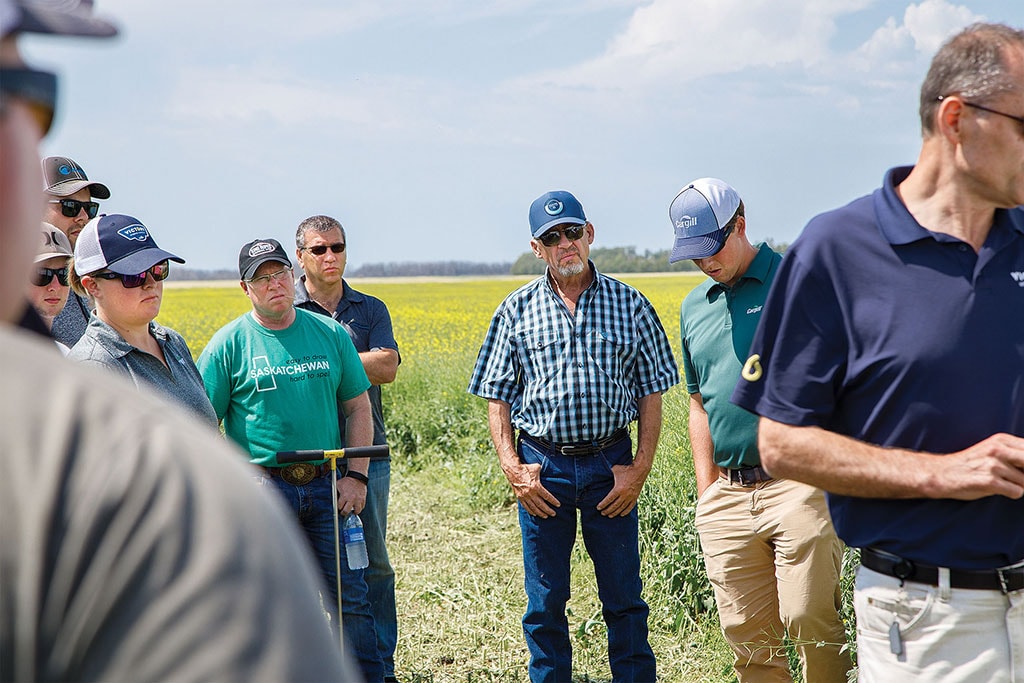 peope in field learning about latest research