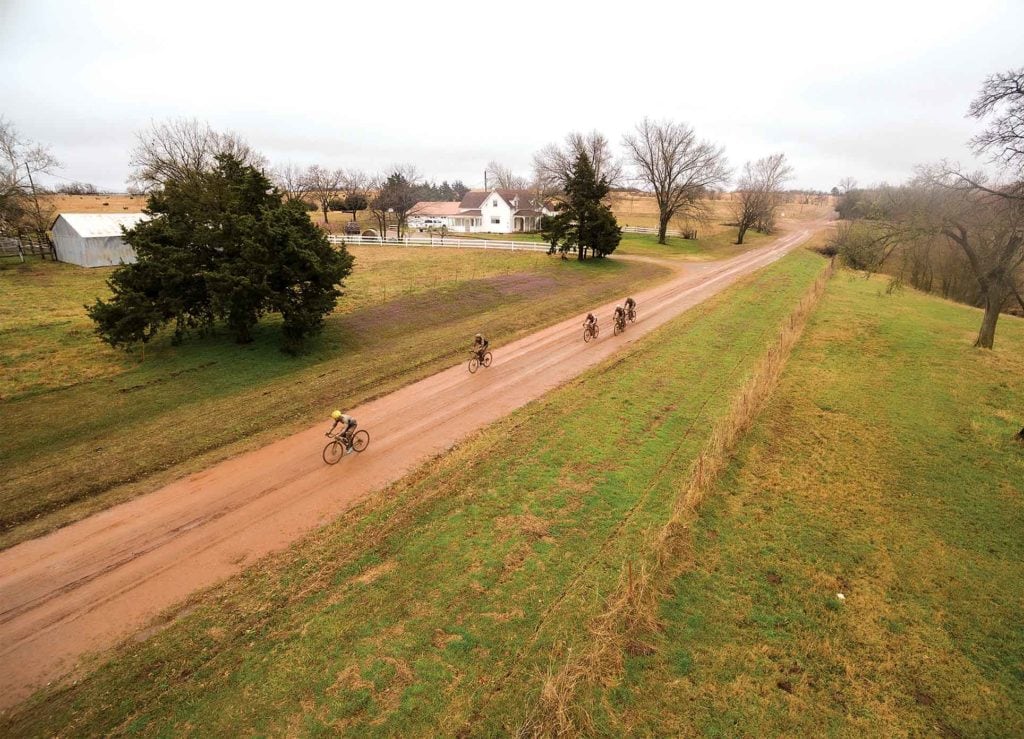 Cyclists on gravel road