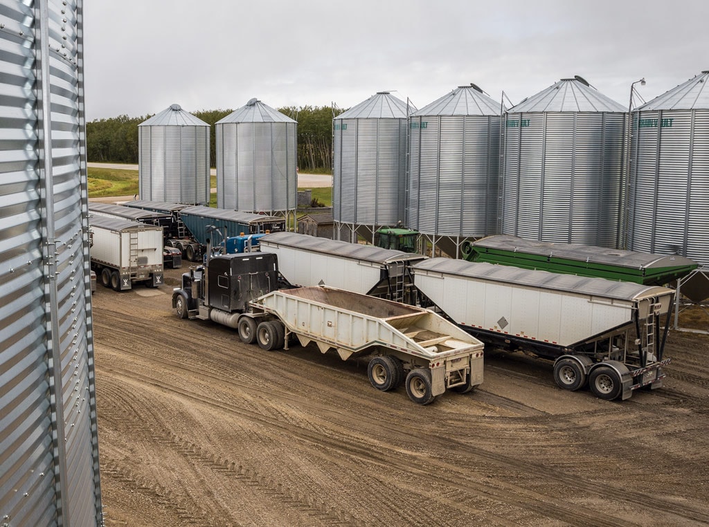 binyard photo with trucks and multiple bins