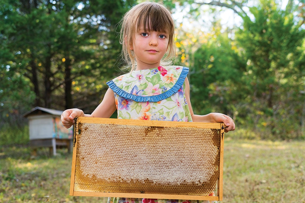 Zaryana Sharashkin helped with honey harvest in Missouri.