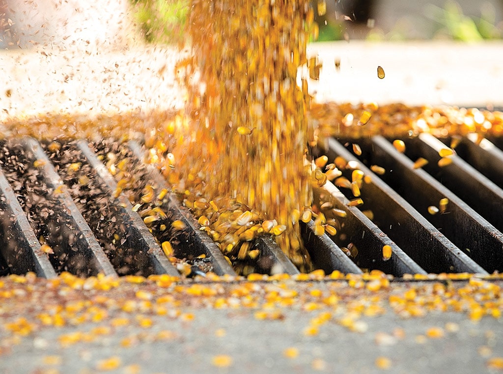 grain falling down through grate