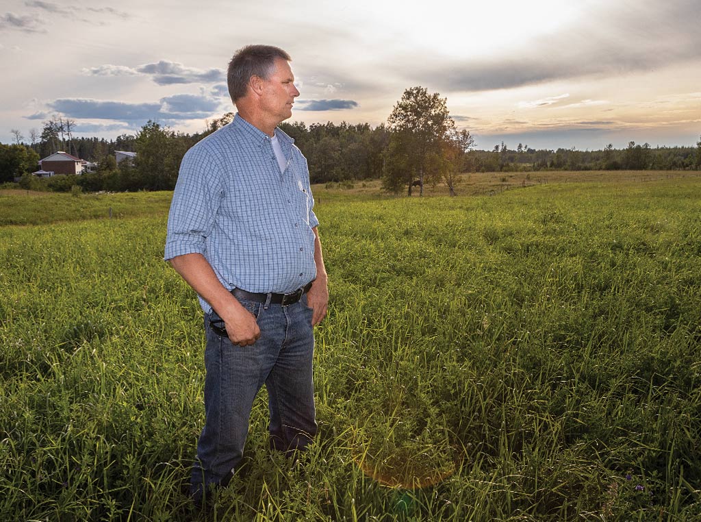 Paul standing in field