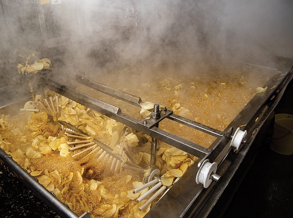 potato chips in deep fryer