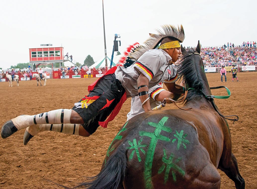 horse rider jump-mounting horse
