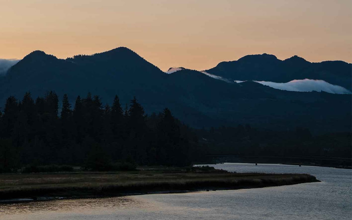 mountainous coastline at sunrise