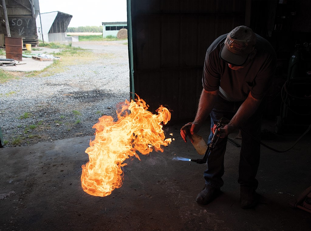 Man with blow torch