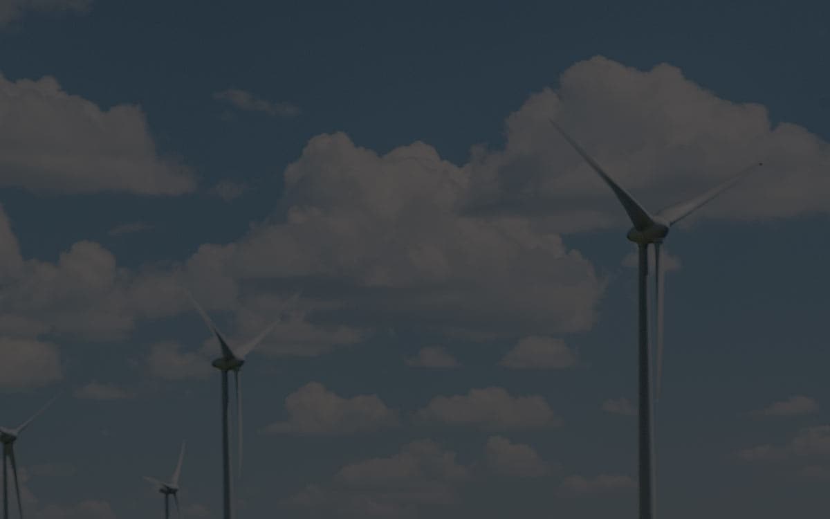 background image of wind turbines