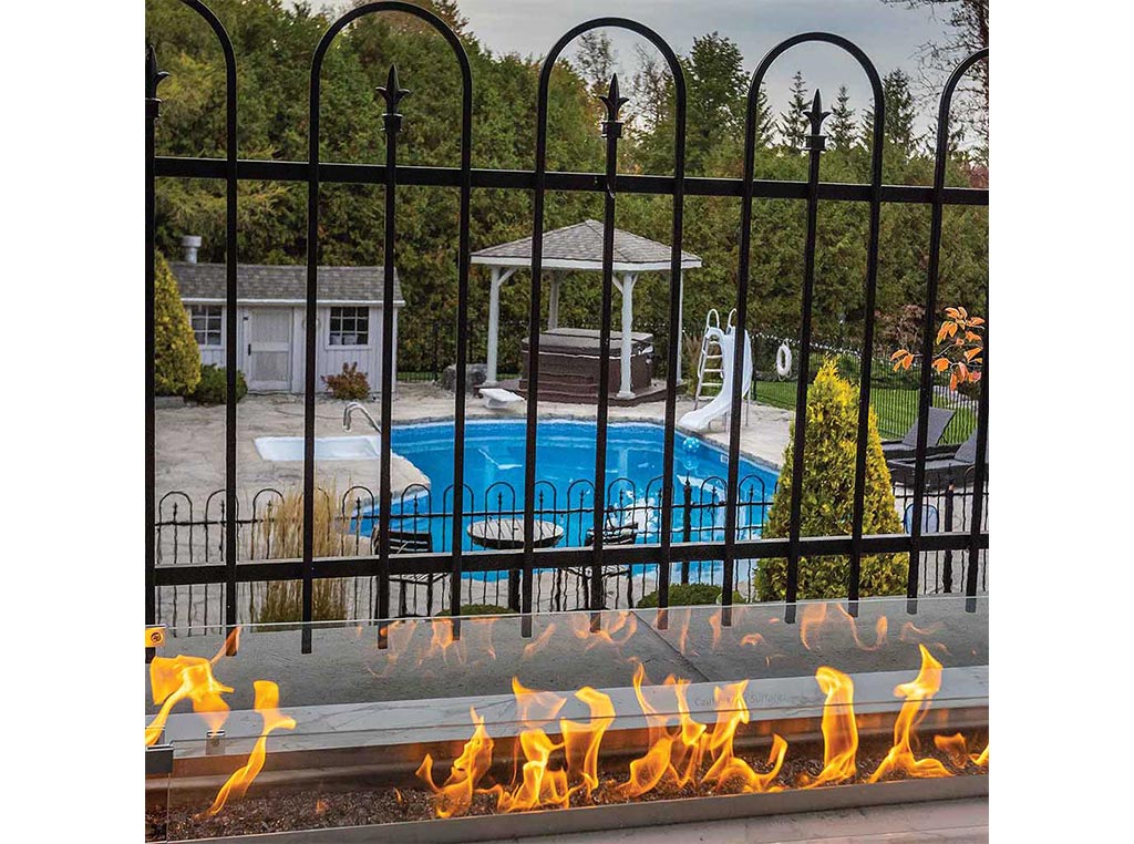 gas fireplace overlooking outdoor pool