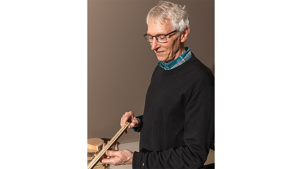 David Sauchyn holding a ruler