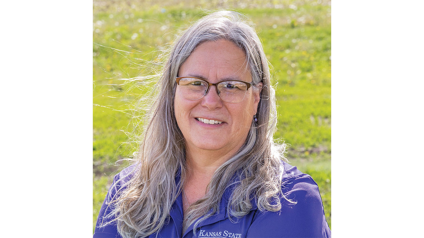 Person in Kansas State Agronomy shirt standing outdoors