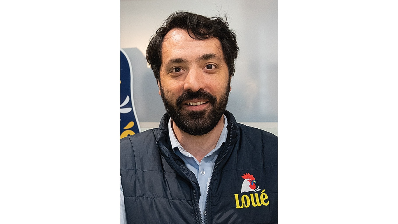 A close up of a person wearing black vest.