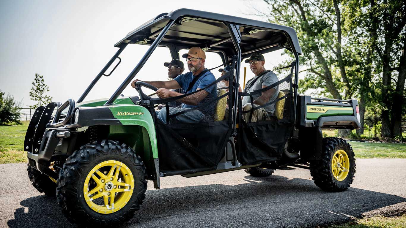 four men in 4 passenger gator